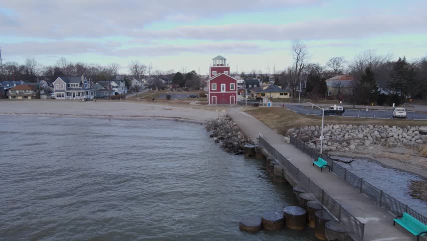 Scenic Beachfront with Iconic Red Lighthouse at Luna Pier, Michigan, USA