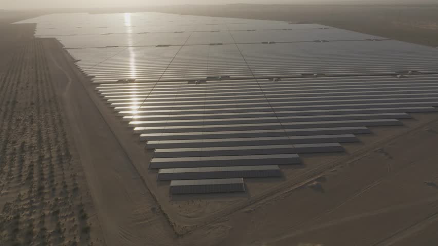 Aerial view of expansive solar panels in Al Dhafra, Abu Dhabi, United Arab Emirates.
