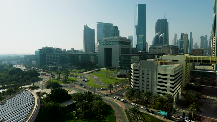 Aerial view of Dubai's modern skyline with skyscrapers and financial center, United Arab Emirates.