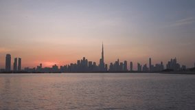 Aerial view of Dubai skyline at sunset, United Arab Emirates. - Powered by Shutterstock - Get 15% off with code: PIKWIZARD15
