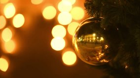 New year christmas tree branch at yellow flickering lights of garlands copy space background, merry christmas and happy new year mood at twinkling lights of street decorations, close up view to lights - Powered by Shutterstock - Get 15% off with code: PIKWIZARD15