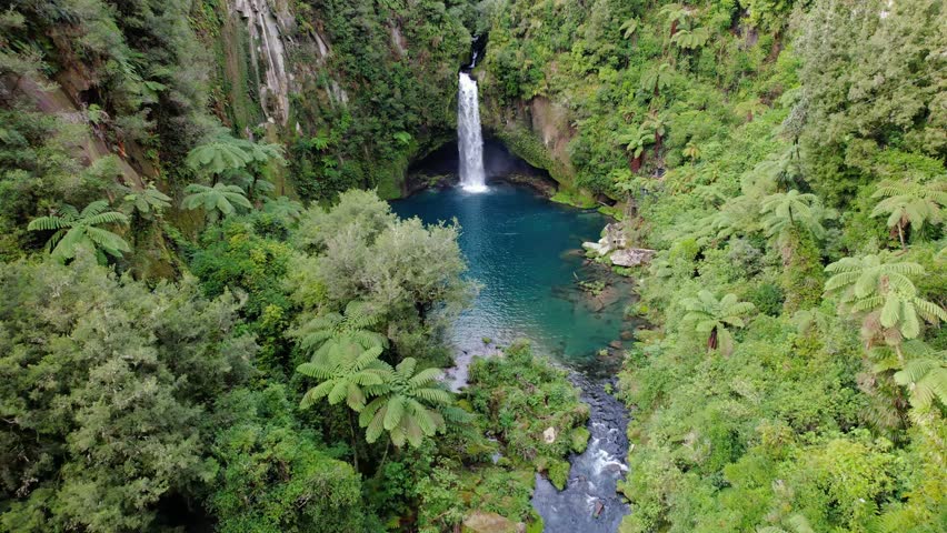 Omanawa Falls Enclosed By Steep Rock Mountain Near Tauranga, Bay of Plenty In North Island, New Zealand. Aerial Drone Shot