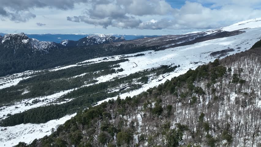 Frozen Mountain At Villarrica Los Rios Chile. Snow-Capped Volcano Releasing Plumes Of Smoke Into Blue Sky. Outdoor Tourism Icon Patagonia Glacier. Outdoors Patagonia Aerial View. Villarrica Los Rios.