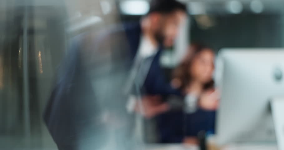 Business, people and discussion on computer in office for training, coaching and brainstorming ideas of project. Woman, man and digital to review finance report, teamwork and advice of blur