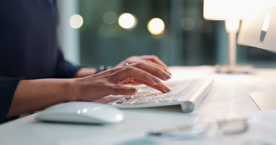 Finance, hands or keyboard in office for typing, company update or budget review on computer. Woman, productivity and tech at table for communication, feedback and online report or administration