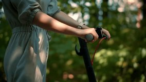 Eco Driving Electric Scooter. Relax On Kick Scooter. Sharing Ecology Transport. Woman Riding On Rent E-scooter. Urban Style Green Energy City Transport. Ecological Transportation Mobility In City Ride - Powered by Shutterstock - Get 15% off with code: PIKWIZARD15