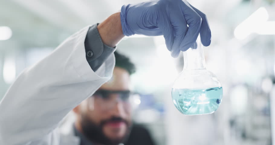 Man, beaker and chemical shake in laboratory, scientist and experimental chemistry for research. Formulation, cure innovation and reaction observation, safety gloves and breakthrough study for career