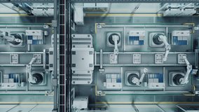 Top Down Footage of a High Tech Factory with Robotic Arms Assembling Electronic Components on a Production Line Conveyor Belt. Automation and Artificial Intelligence in a Modern Manufacturing Process - Powered by Shutterstock - Get 15% off with code: PIKWIZARD15