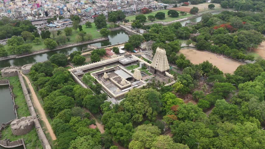 Aerial Drone Shot of Temple Surrounded by Trees, Ponds and Buildings