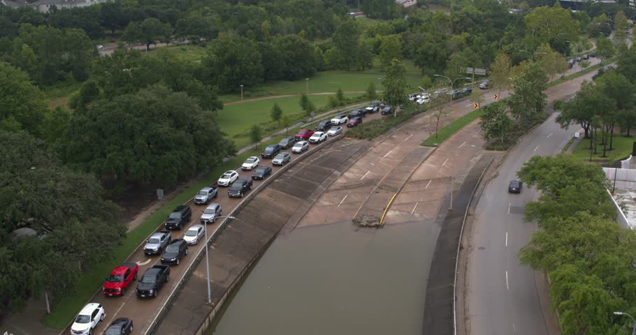 Birds eye view of under bridge flooding on Allen Parkway in Houston, Texas