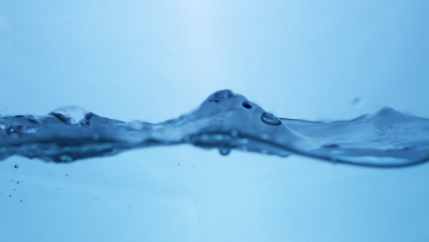 Liquid Tranquility Smooth Flowing Water Surface in Slow Motion.