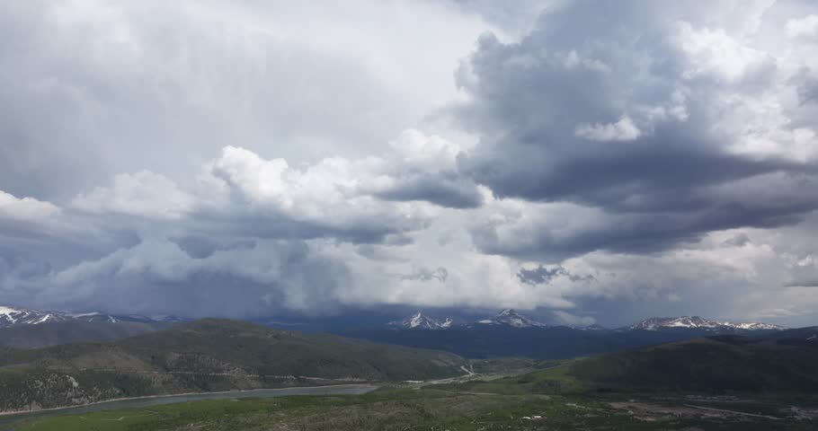 Aerial view of clouds over a mountain landscape in Colorado