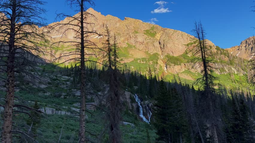 Morning waterfalls Chicago Basin Colorado Silverton camping San Juan Range Needle Creek Trail Rocky Mountains Mount Eulos summer fourteener Sunlight Windom Peak Silverton July blue sky pan right
