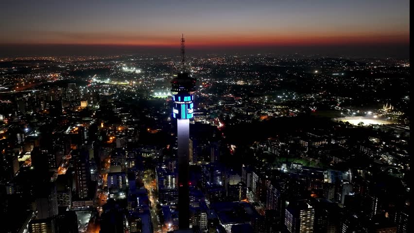 Hillbrow Tower At Johannesburg Gauteng South Africa. Breathtaking Aerial View Of Modern Telecommunication Tower. Sunset Sky Clouds Downtown Cityscape. Sunset Exterior Up Above. Johannesburg Gauteng.