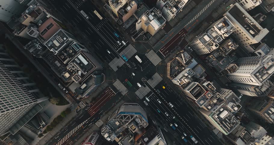 Aerial top view 4k video by drone of building in Tokyo city, Japan. Intersection road in Tokyo Japan. Cars on the streets of Tokyo, Japan, in the morning