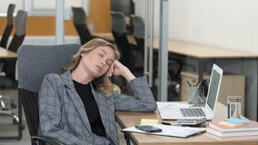Professional woman sleeping in the office. Business woman having a nap at her office desk. - Powered by Shutterstock - Get 15% off with code: PIKWIZARD15