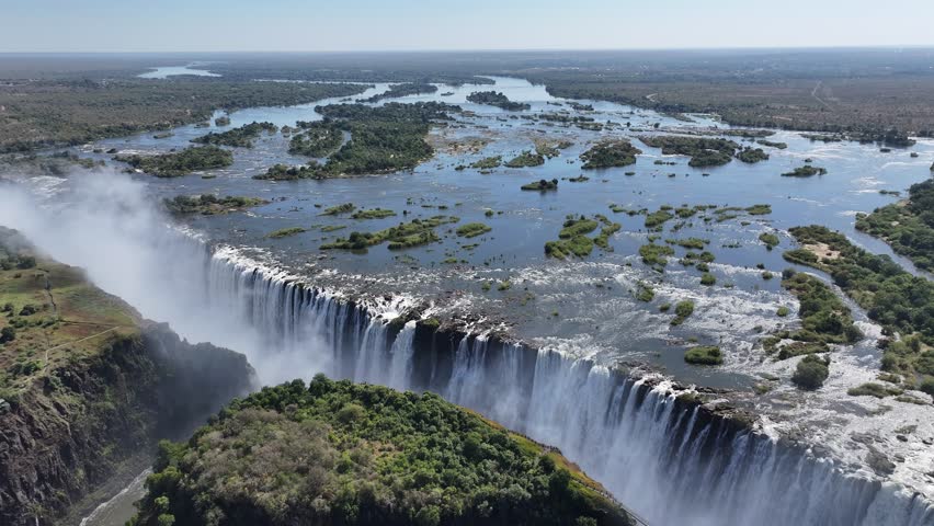 Zimbabwe Skyline At Victoria Falls Matabeleland North Zimbabwe. Breathtaking Aerial Footage Of Waterfalls As Natural Wonder. Landscape Clouds Sky Waterfall Tropical. Mountain Panoramic View.