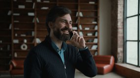 Happy smiling Caucasian senior bearded male man guy businessman psychotherapist talking mobile cellphone phone call device psychologist speaking remote consulting planning business appointment office - Powered by Shutterstock - Get 15% off with code: PIKWIZARD15