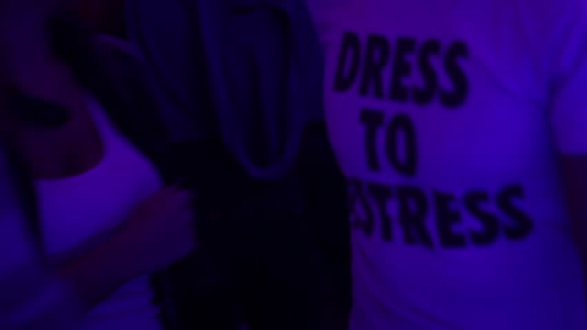 Girl dancing in night club, enjoying herself