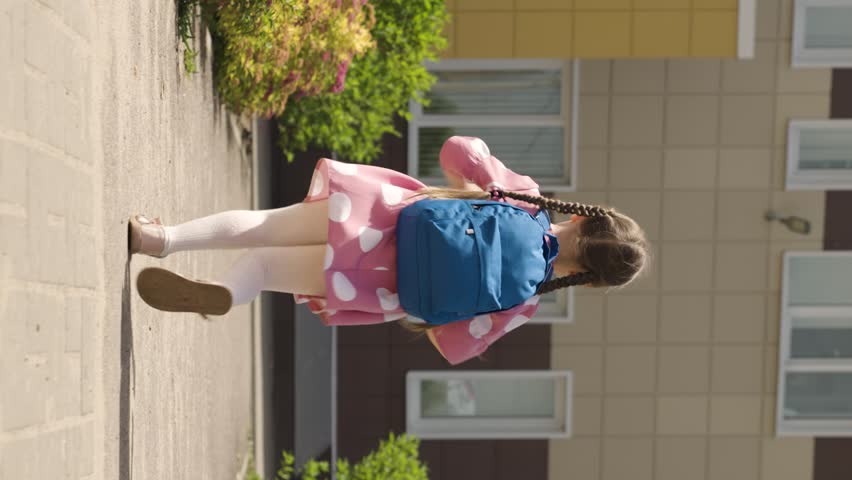 child kid girl daughter running school backpack, returning from school from lessons, children education school yard house running leg, carefree kid joy, kid enjoying outdoors, jumping child happiness