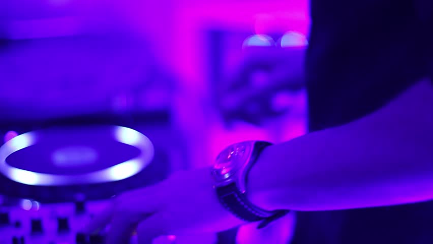 DJ's platter spinning in the night club