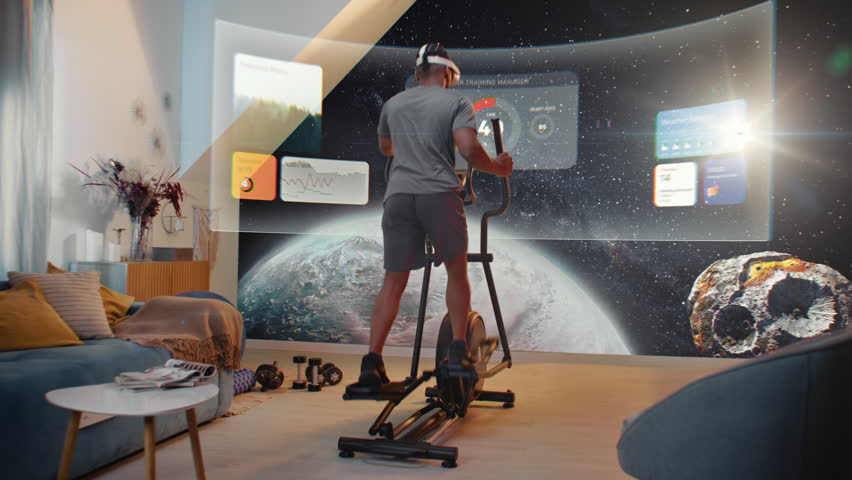 Metaverse futuristic home gym. African American athlete in VR headset training on orbitrek. Virtual screen shows image of the universe and AR workout app with icons, timer and health care statistics. - Powered by Shutterstock - Get 15% off with code: PIKWIZARD15
