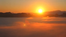 Serene sunrise with golden light illuminating misty mountain landscape in early morning. Beautiful horizon view with soft mist covering valleys. Capturing tranquility and beauty of nature. - Powered by Shutterstock - Get 15% off with code: PIKWIZARD15