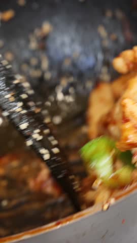Cooking teriyaki chicken with rice, street food style. panning shot of Japanese food rice serves with chicken in Teriyaki sauce