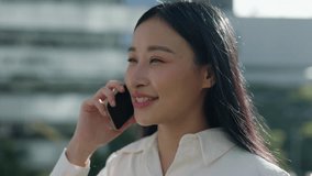 Attractive Young Lady Standing in the Street Talking On Telephone, Resolves a Work Issue with Boss. Cute Happy Joyful Business Lady Having Conversation via Phone. Close Up - Powered by Shutterstock - Get 15% off with code: PIKWIZARD15