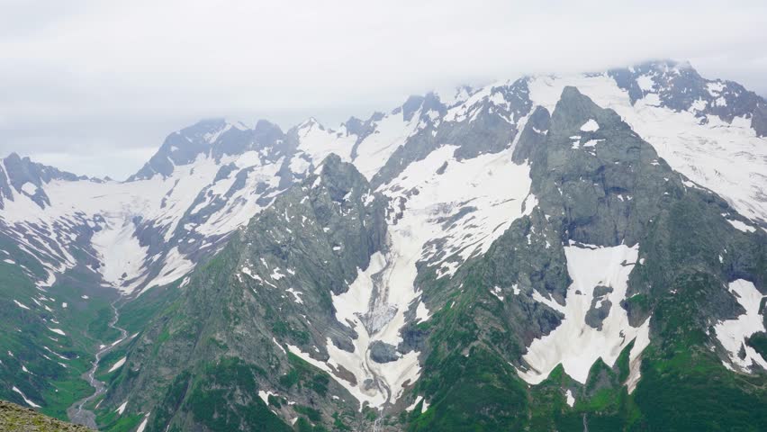 Aerial View of Snow-Capped Mountains in the Caucasus Range.