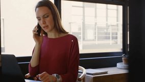 Animation of network of connections with people icons over caucasian businesswoman using smartphone. Global business, connections, computing and data processing concept digitally generated video. - Powered by Shutterstock - Get 15% off with code: PIKWIZARD15