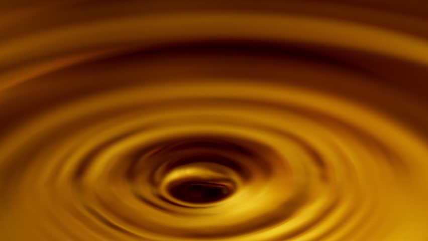 Super Slow Motion of Dropping Dark Golden Coffee or Whiskey Liquid. Filmed on High Speed Cinema Camera, 1000fps.