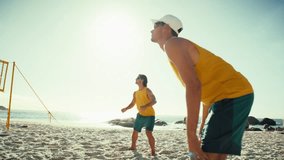 Handheld action shot of two professional male beach volleyball players winning a point in this sunny beach scene. - Powered by Shutterstock - Get 15% off with code: PIKWIZARD15