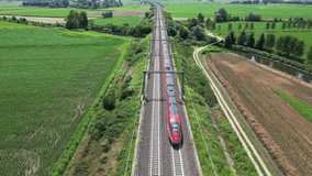 Europe, Italy , Milan - Frecciarossa  Hight speed 300km h train railway from Milan  to Rome view from the drone - the faster way to travel in Italy for tourist and passengers - tourist destination  - Powered by Shutterstock - Get 15% off with code: PIKWIZARD15