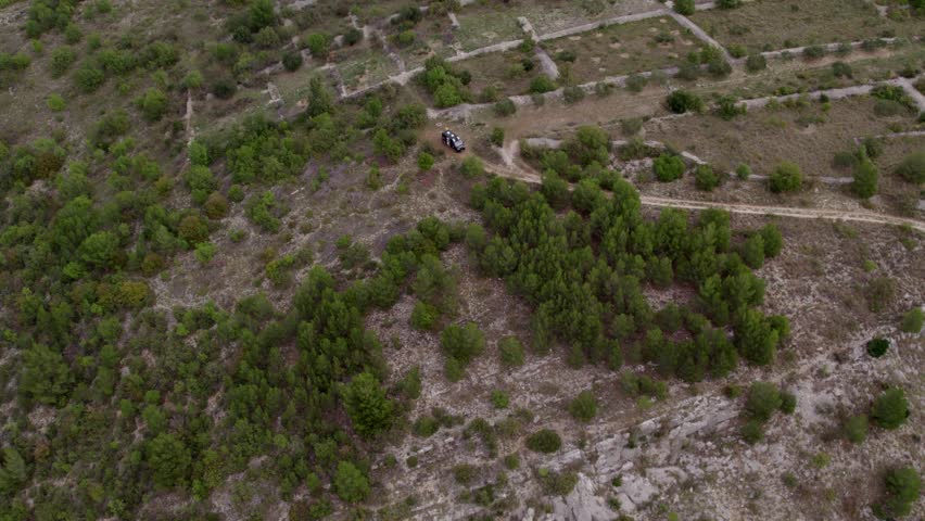 Aerial view of river, hills, vegetation, terrain, road in national park, Dubravice, Sibenik-Knin, Croatia.