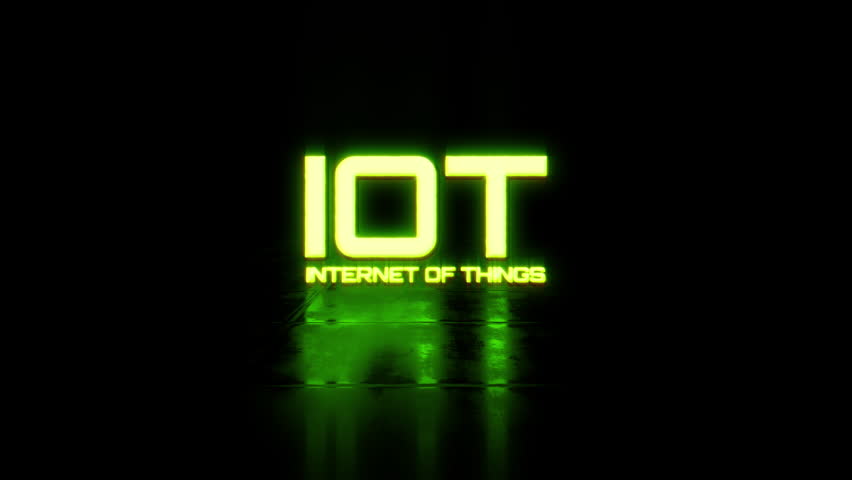 Animation text of IOT Internet of things neon green glitch text effect cinematic title on black abstract backgroud. 