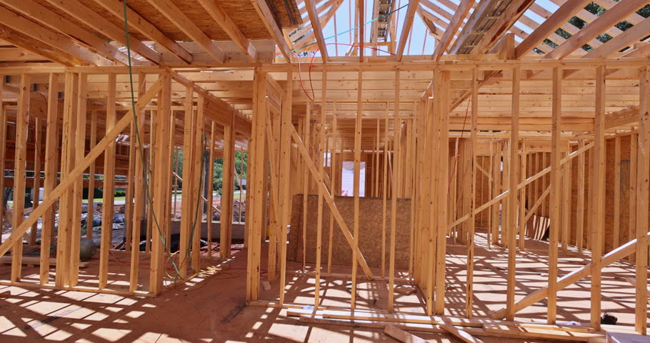 In construction of new house, wood frame beams are used for framing