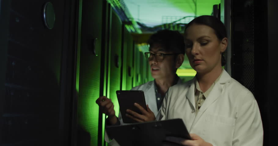Animation of eco icons and data processing over diverse business people by computer servers. Global environment, connections, computing and data processing concept digitally generated video.