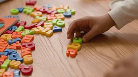 Hands lay out letters alphabet learning study children teach preschool educational kindergarten english language school text lettering development interactive literacy creativity toy colourful toddler - Powered by Shutterstock - Get 15% off with code: PIKWIZARD15