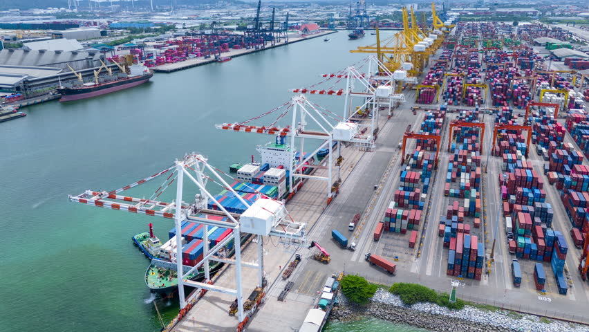 Time lapse Tug boat pulling Cargo Container Ship going out from Cargo international sea port. Freight forwarding transportation service logistics . transportation induntry International Shipping  - Powered by Shutterstock - Get 15% off with code: PIKWIZARD15