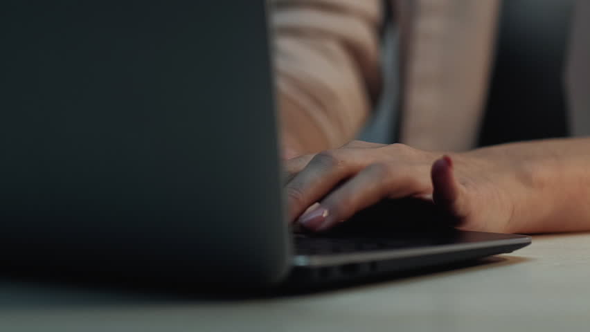 Laptop typing. Online education. Unrecognizable female hand pressing key computer searching info taking notes writing student research.