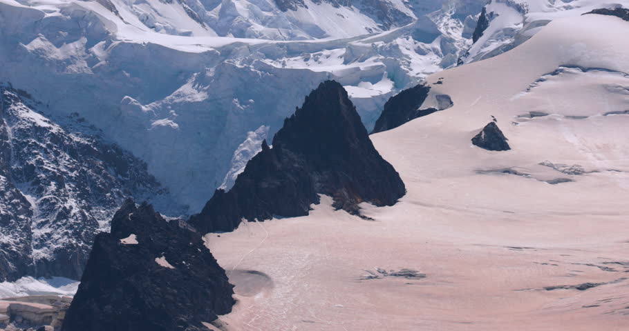 The Epic Peak Of The Chamonix Mont Blanc Mountains Among The Clouds, France