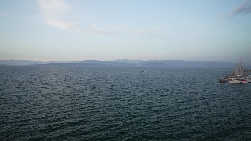 View of Ionian Sea and Old Fortress of Corfu during golden hour, Corfu Town, Corfu, Ionian Islands, Greek Islands, Greece, Europe