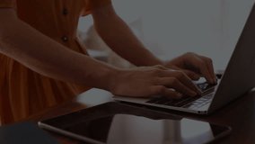 Animation of data processing over caucasian woman using tablet and laptop. Global finance, business, connections, computing and data processing concept digitally generated video. - Powered by Shutterstock - Get 15% off with code: PIKWIZARD15