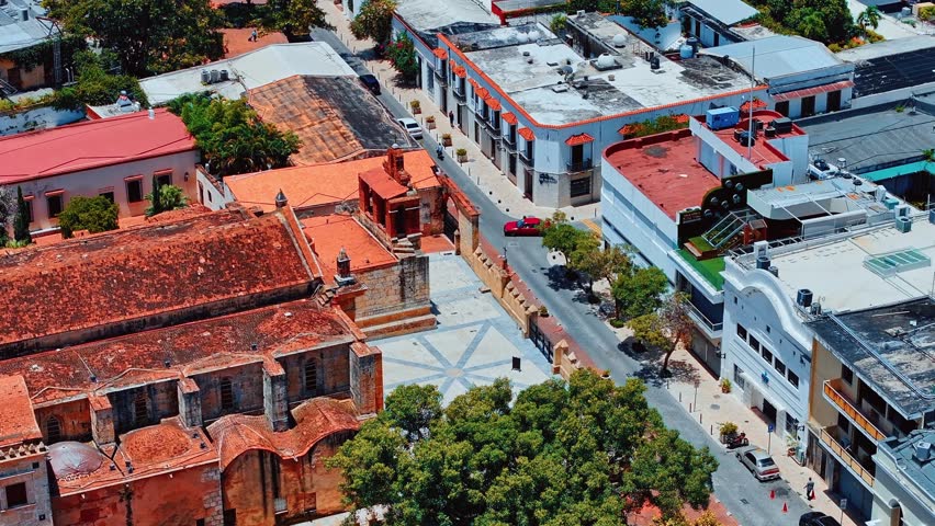 Top view of an ancient building - a landmark of Santo Domingo. Aerial view of the beautiful capital of Central America. Travel and vacation concept. Panorama of the city landscape during the day.