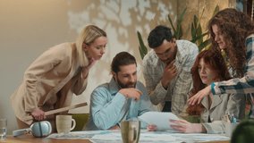 Business team creative freelance group coworkers architects partners students men women girls guys male female study talk discuss corporate startup project paperwork on table in office coworking cafe - Powered by Shutterstock - Get 15% off with code: PIKWIZARD15