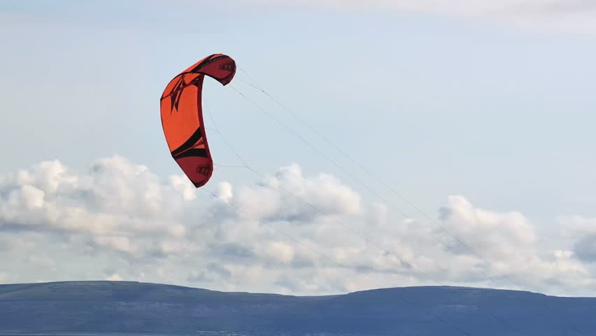 Kite surfing, kite flying high in the sky, water adventure activities, extreme sports, nature background, 4k