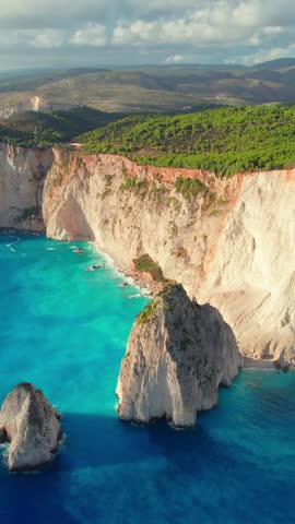 Keri cliffs on Zakynthos island, Ionian sea, Greece. Beautiful Akra Keri rock in the sea in Zante. Aerial drone footage of sea coast with turquoise sea water on Zante Greek island.