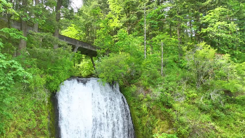 Aerial Tilt Shot of Bridal Veil Falls in Lush Columbia Gorge