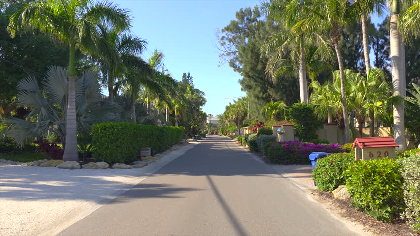 POV driving on Casey Key scenic road in sunny Florida.